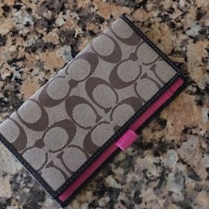 Coach check book cover.